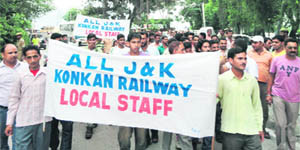 Konkan railway engineers hold a rally in Reasi on Wednesday.
