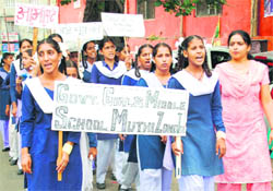 Students of Government Girls Middle School, Muthi, take part in a Literacy Day awareness rally in Jammu on Wednesday.