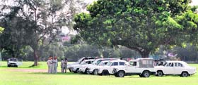 Vehicles of the Chief Minister’s security staff parked inside a football ground at the PAU in Ludhiana