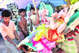 Idols of Lord Ganesha being carried for Ganesh Chaturthi celebrations, beginning from Saturday.