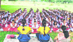 Yoga students of Dev Sanskriti University teach students at a government college at Dantewada district in Chhattisgarh.