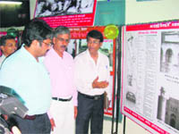 Visitors view archives relating to the freedom movement at an exhibition organised at CRM Jat College in Hisar.