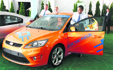 In this photo, US President Barack Obama gets into an electric Ford Focus as he attends the groundbreaking of a factory for Compact Power Inc. in Holland, Michigan. The new battery-powered vehicles have much longer ranges than their predecessors  up to 250 miles in the case of the Tesla Roadster.
