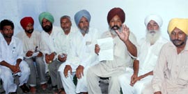 Representatives of various farmer and worker unions address a press conference against the Punjab Government in Bathinda on Friday.