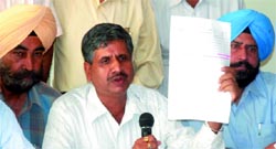 Sarup Singla, area in-charge of SAD, addresses a press conference in Bathinda on Friday.