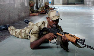 CISF and police personnel carry out a mock drill in Gurgaon on Friday.