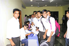Students line up for blood donation at the ICFAI University in Dehradun on Friday. 