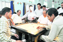 Matches being played during the Bar Association Carrom Tournament in Dehradun on Friday.