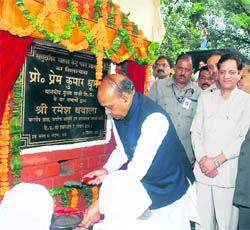 Chief Minister PK Dhumal lays the foundation stone of a community health centre at Jwalaji in Kangra on Friday. 