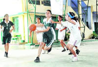 A match under way at the Sixth Gardner Silver Jubilee Inter-School Basketball Tournament at St Thomas College, Dehradun