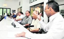 Participants discuss the fallout of the closure of the Lohari Nagpala power project at a meeting in Dehradun