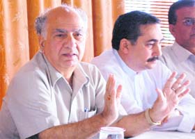 BJP national vice-president Shanta Kumar addresses a press conference at Dharamsala