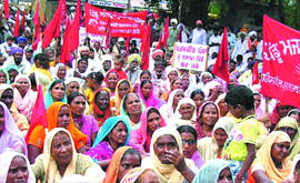 Activists of the Pendu Mazdoor Union hold a demonstration in Kapurthala on Saturday.