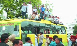 Arrested ETT teachers being taken away by the police in Bathinda on Sunday.