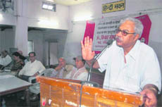 Tapan Sen, CPM MP, addresses party workers in Dehradun on Sunday.