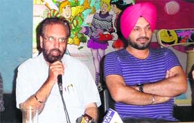 Film producer-director Manmohan Singh and actor Ghuggi at Sirsa