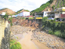 Industrial units along the Markandey river near Suketi bear the brunt of bad roads.