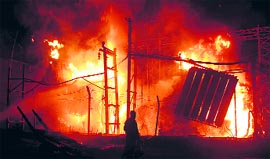 Transformers on fire at Transport Nagar in Ludhiana on Saturday night.