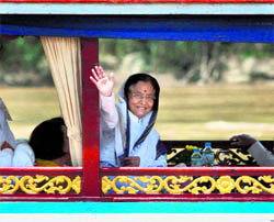 President Pratibha Patil takes a ride in a boat in the Mekong river at Luang Prabang, Laos
