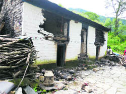 A damaged house at Qurie-Jimia village.