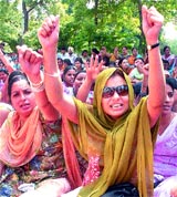 ETT teachers stage a dharna in protest against the arrest of their colleagues in Jalandhar on Monday.