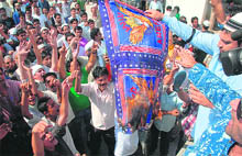 Protesters hold a demonstration in Jammu on Monday against the alleged sacrilege in the US.