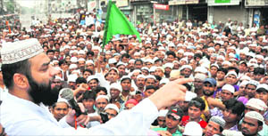 A Muslim leader addresses a gathering in Ludhiana on Monday.