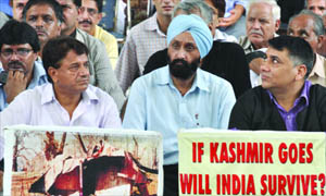 Kashmiri Pandits stage a protest against the government failure to halt terror in the strife-torn valley.