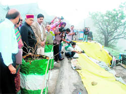 Chief Minister PK Dhumal inspects damages caused to the Ridge due to heavy downpour in Shimla on Tuesday