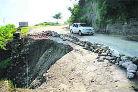 A damaged stretch on the road leading to Mansar lake. 