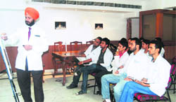 Dr S.P.S. Grewal, CEO Grewal Eye Institute, Chandigarh, with optometry course students