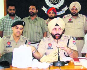 SSP Gurpreet Singh Gill addresses a press conference at Police Lines in Patiala