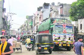 Vehicles pass through a congested national highway at Kalka