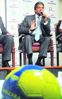Vice-Chairman and MD of Mahindra Group Anand Mahindra speaks during the launch of Mahindra Youth Football Challenge at a press conference in Mumbai on Wednesday.