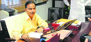 Suspended DAV principal BC Josan in his office