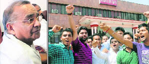 students protest his suspension; and the new principal, Shashi K Gupta.