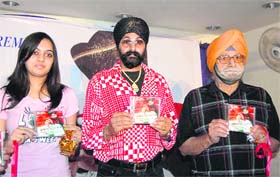 Harjeet Singh Titlee with hockey Olympian Hardayal Singh at the launch audio CD in Dehradun