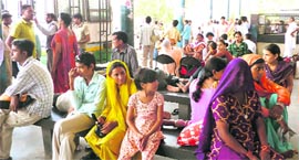 Bus passengers stranded at the Hisar bus stand on Thursday.
