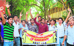 Members of the ABVP protest against the commercialisation of education in front of GGM Science College in Jammu