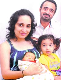 Gursimran and Sumeet with their children