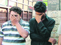Liquor peddlers in police custody in Ludhiana. 