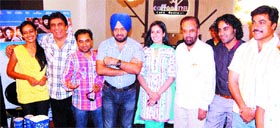 The cast, producer and director of Punjabi movie Ik Kudi Punjab Di during its premiere  in Amritsar on Friday.