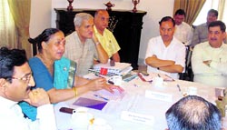 Governor Margaret Alva and Chief Minister Ramesh Pokhriyal Nishank hold a meeting at the Raj Bhawan in Dehradun on Thursday.