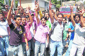 ABVP activists protest outside the HP Board of School Education in Dharamsala on Friday. 