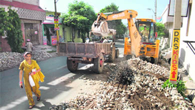 Road widening work in progress in the Trikuta Nagar area of Jammu.