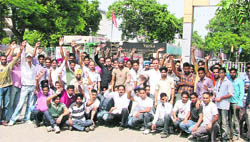 Workers of Verka milk plant protest in Ludhiana on Friday.