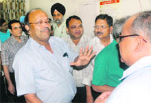 Dr GK Rath, chairman of the ICMR team formed under the cancer control programme, interacts with doctors at the Civil Hospital in Bathinda on Friday.
