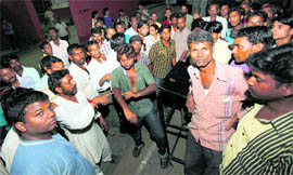 Residents of Colony No 5 at the Sector 34 police station in Chandigarh on Saturday night