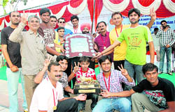 Members of the Gujarat team who won the 24th All-India Postal Basketball Tournament