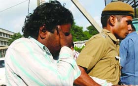 The school cab driver, Lalit Ratwal, being taken to the Tis Hazari Courts in New Delhi